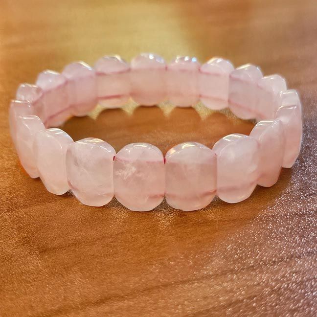 Rose quartz bracelet with flat faceted pink slabs, offering soothing heart‑centered energy and emotional healing.