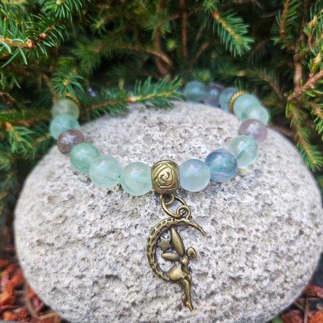 Rainbow Fluorite 8mm bead bracelet with bronze or silver fairy charm for intuition and magical clarity.