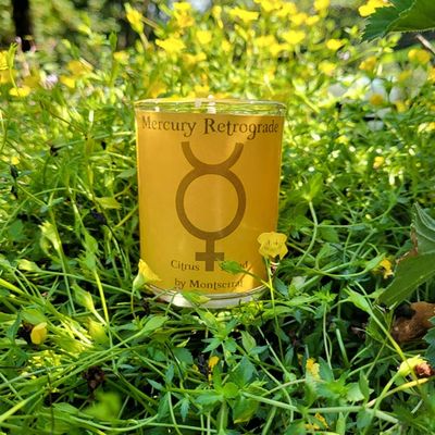 Mercury Retrograde organic soy candle with Lemon, Orange, and Grapefruit for clarity, focus, and communication.