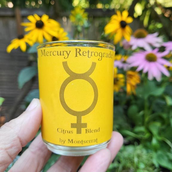 Mercury Retrograde organic soy candle with Lemon, Orange, and Grapefruit for clarity, focus, and communication.