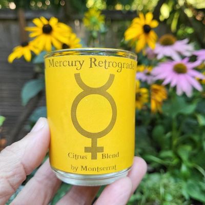 Mercury Retrograde organic soy candle with Lemon, Orange, and Grapefruit for clarity, focus, and communication.