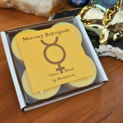 Mercury Retrograde organic soy candle with Lemon, Orange, and Grapefruit for clarity, focus, and communication.