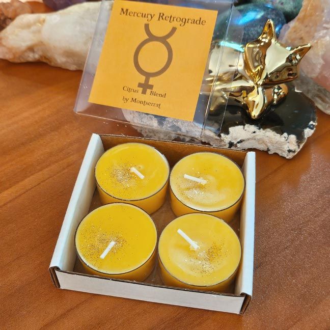 Mercury Retrograde organic soy candle with Lemon, Orange, and Grapefruit for clarity, focus, and communication.