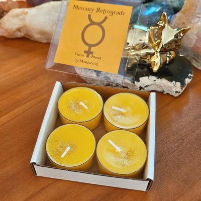 Mercury Retrograde organic soy candle with Lemon, Orange, and Grapefruit for clarity, focus, and communication.