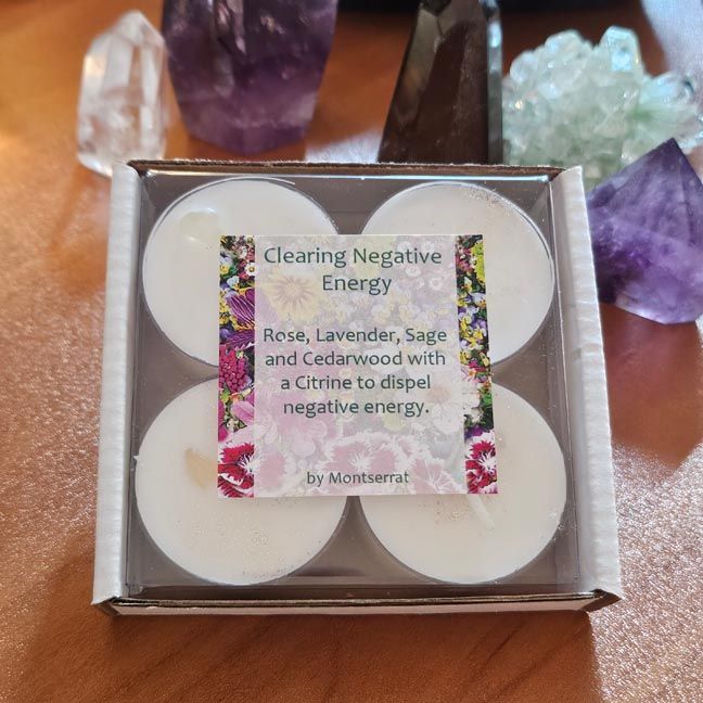Clearing Negative Energy candle with Sage, Frankincense, and Citrine gemstone chip for purification and renewal.