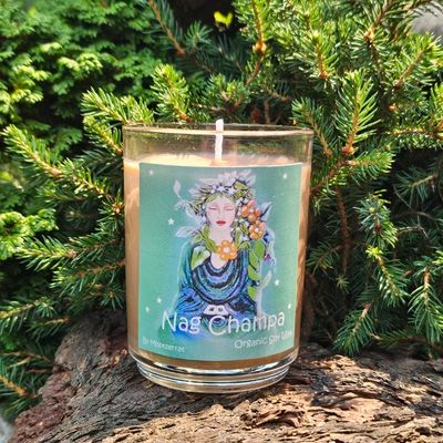 Nag Champa soy candle with sandalwood, frangipani, and Buddha of the Garden artwork in a reusable glass jar.