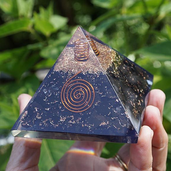 Black Tourmaline orgone pyramid with clear quartz, copper spiral, and brass insert, 3-inch base.