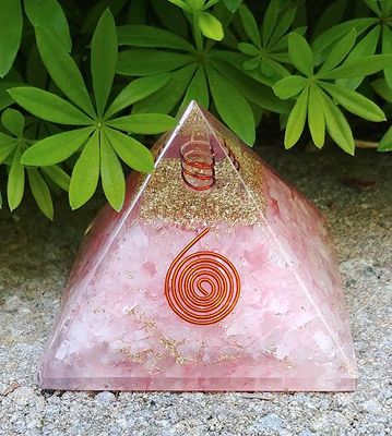 Rose Quartz orgone pyramid with clear quartz, copper spiral, and brass insert, 3-inch base.