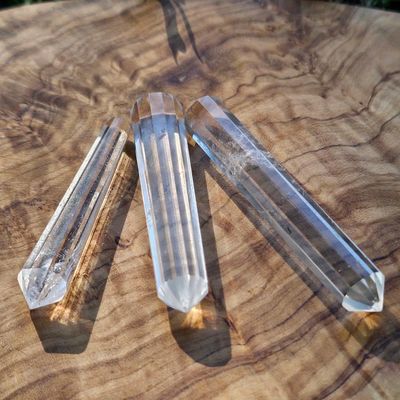 12‑facet Vogel crystal wand for energy direction, healing, and meditation.
