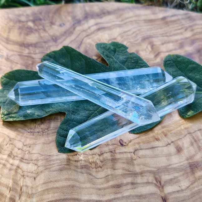 Clear quartz Vogel wand with 12 facets for energy direction, healing, and manifestation.