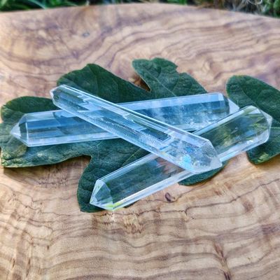 Clear quartz Vogel wand with 12 facets for energy direction, healing, and manifestation.