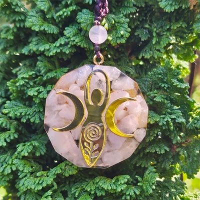 Orgone Rose Quartz necklace with Triple Moon Goddess brass insert and yellow pressed flower.