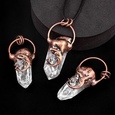 Copper crescent moon and star pendant with clear quartz point on waxed cotton cord, glowing with mystical light.
