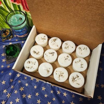 Twelve White Sage organic soy votives topped with dried sage leaves for cleansing and purification.