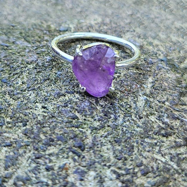Handmade sterling silver ring with a 1/2" free‑form faceted Amethyst gemstone, size 7.
