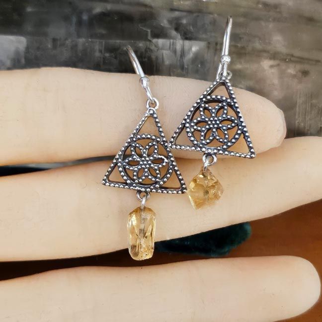 Sterling silver earrings with triangle mandala design and small raw Citrine pieces, 1½" long including hoops.