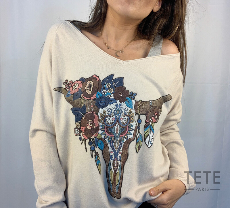 Sweater cuernos y flores