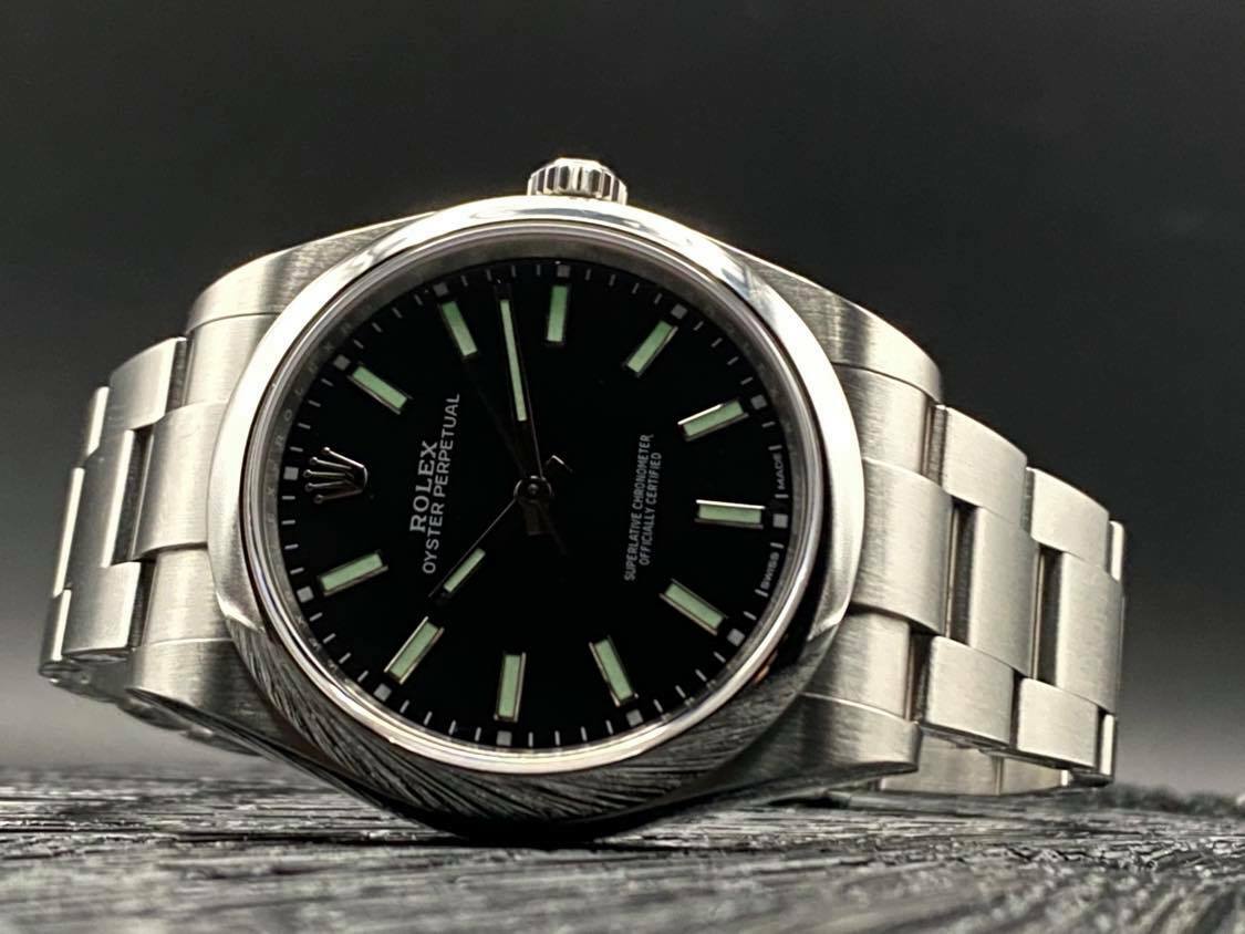 Rolex Oyster Perpetual 39mm Black Dial 114300