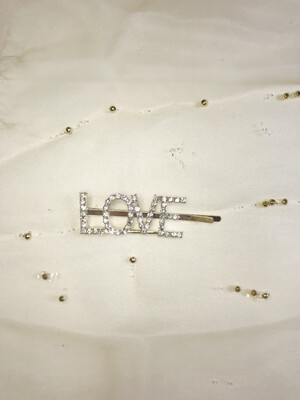 Τσιμπίδι μαλλιών με λέξεις