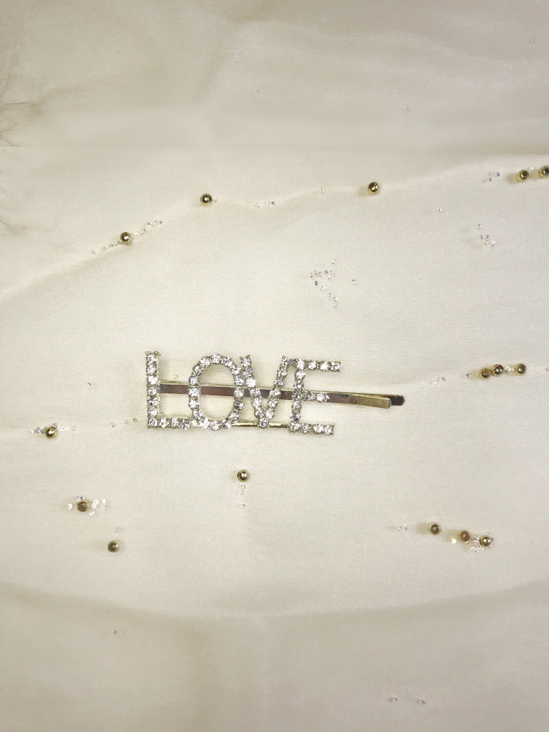 Τσιμπίδι μαλλιών με λέξεις