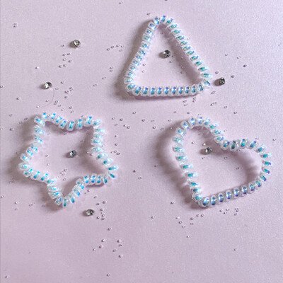 Λαστιχάκια σπιράλ λευκά σχέδια