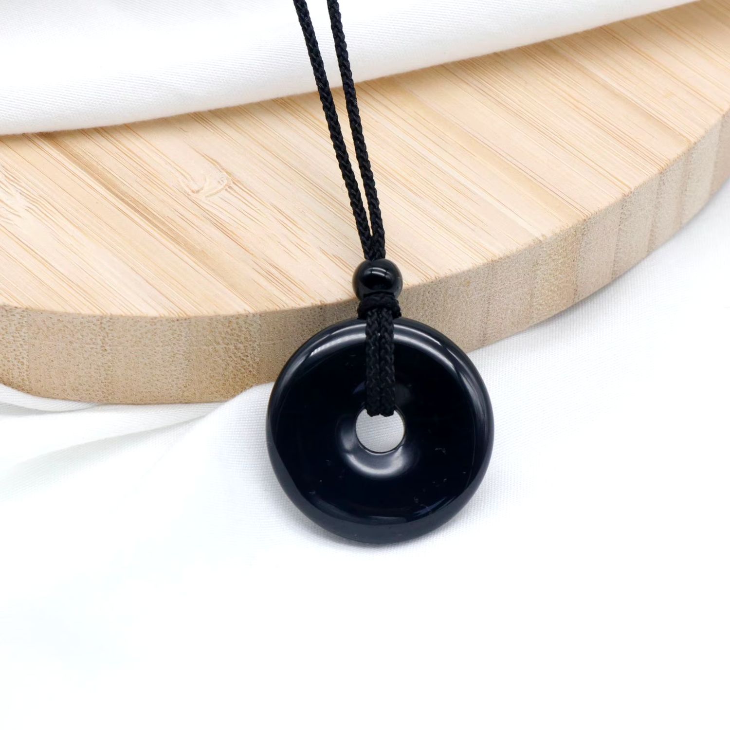 Obsidian Stein Donut 30mm an verstellbarem Band
