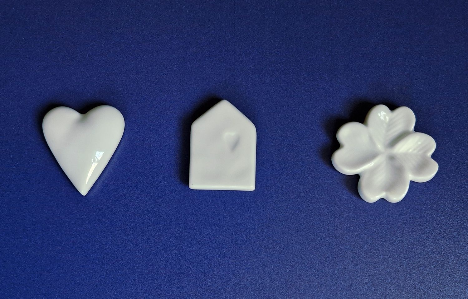 Calamita cuore casa quadrifoglio Display