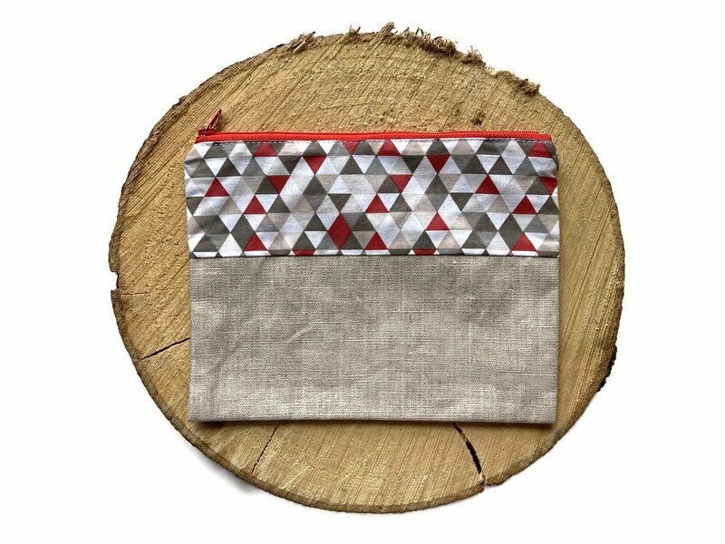 Pochette beige et motifs géométriques rouges, beiges, gris