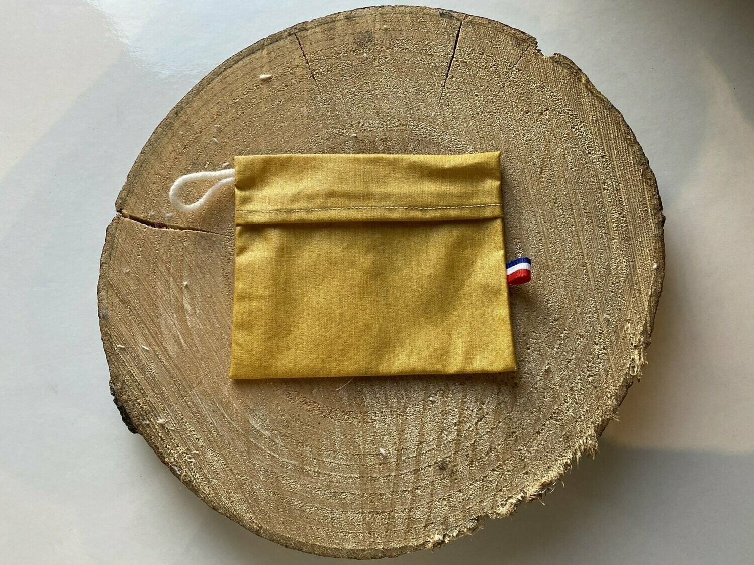 Pochette enduite en "coton enduit moutarde"