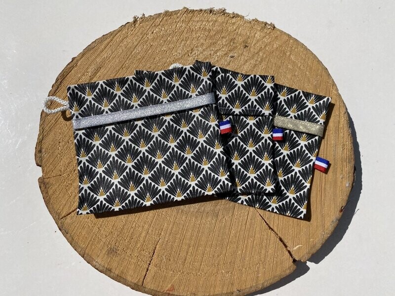 Pochette enduite à motifs géométriques noirs