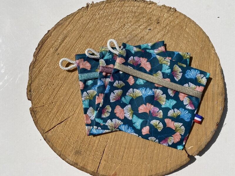 Pochette enduite à motifs feuilles de multiples couleurs