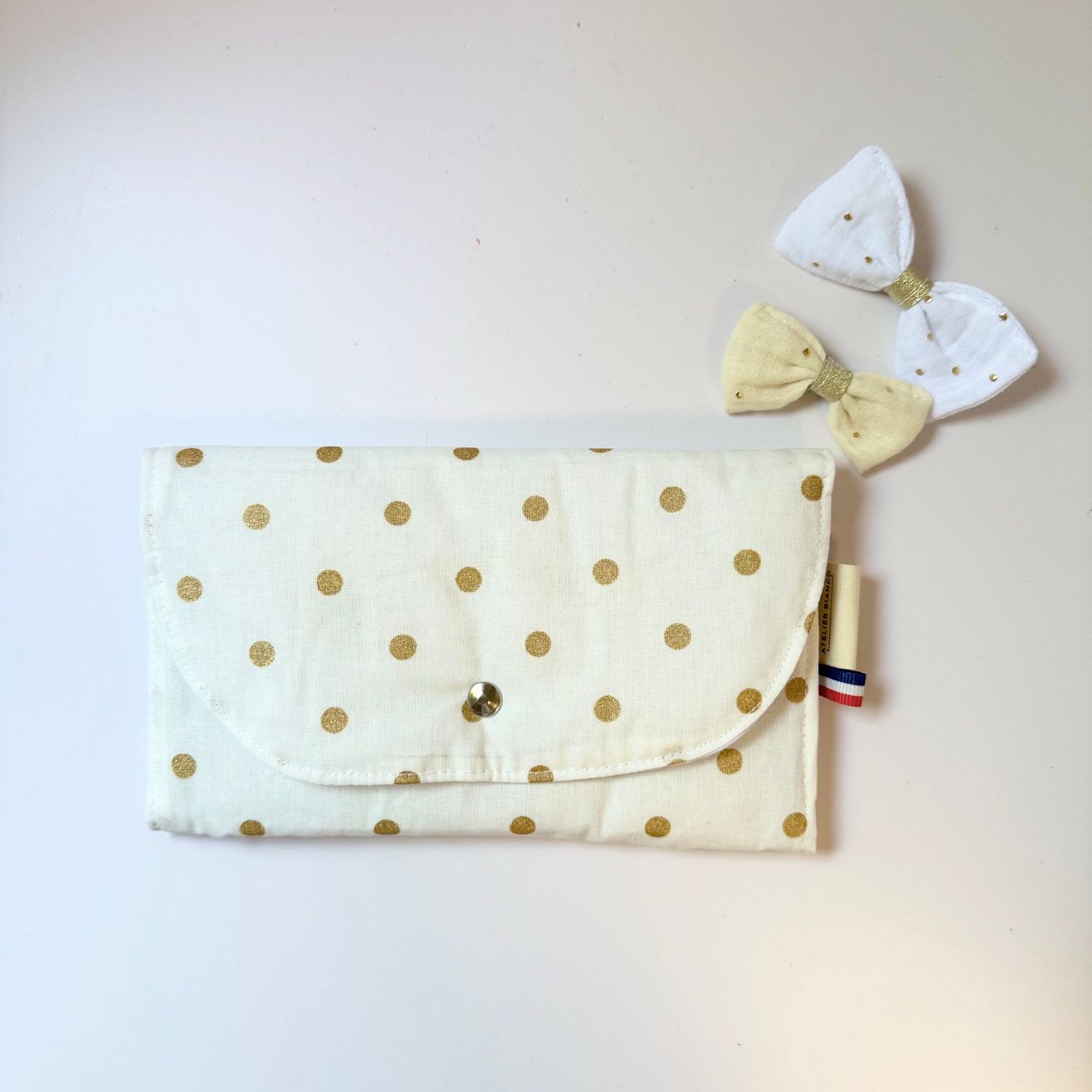 Pochette motifs pois dorés