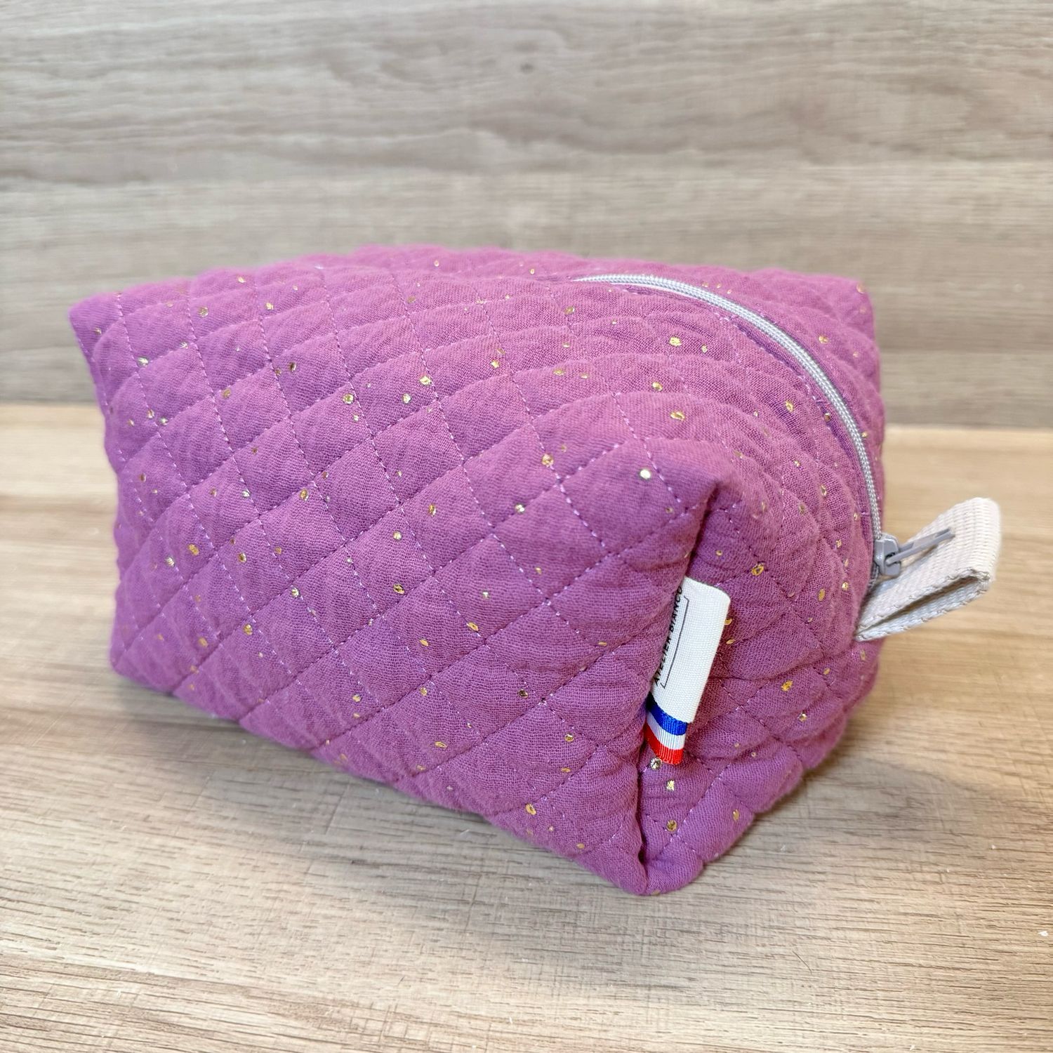 Trousse de toilette en tissu matelassé double gaze à pois dorés