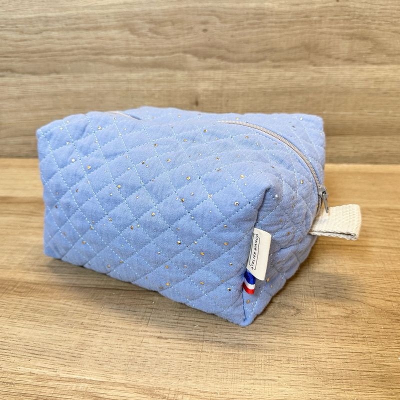 Trousse de toilette en tissu matelassé double gaze bleu denim à pois dorés