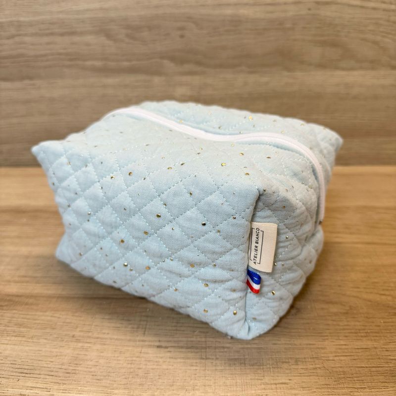 Trousse de toilette en tissu matelassé double gaze bleu clair à pois dorés
