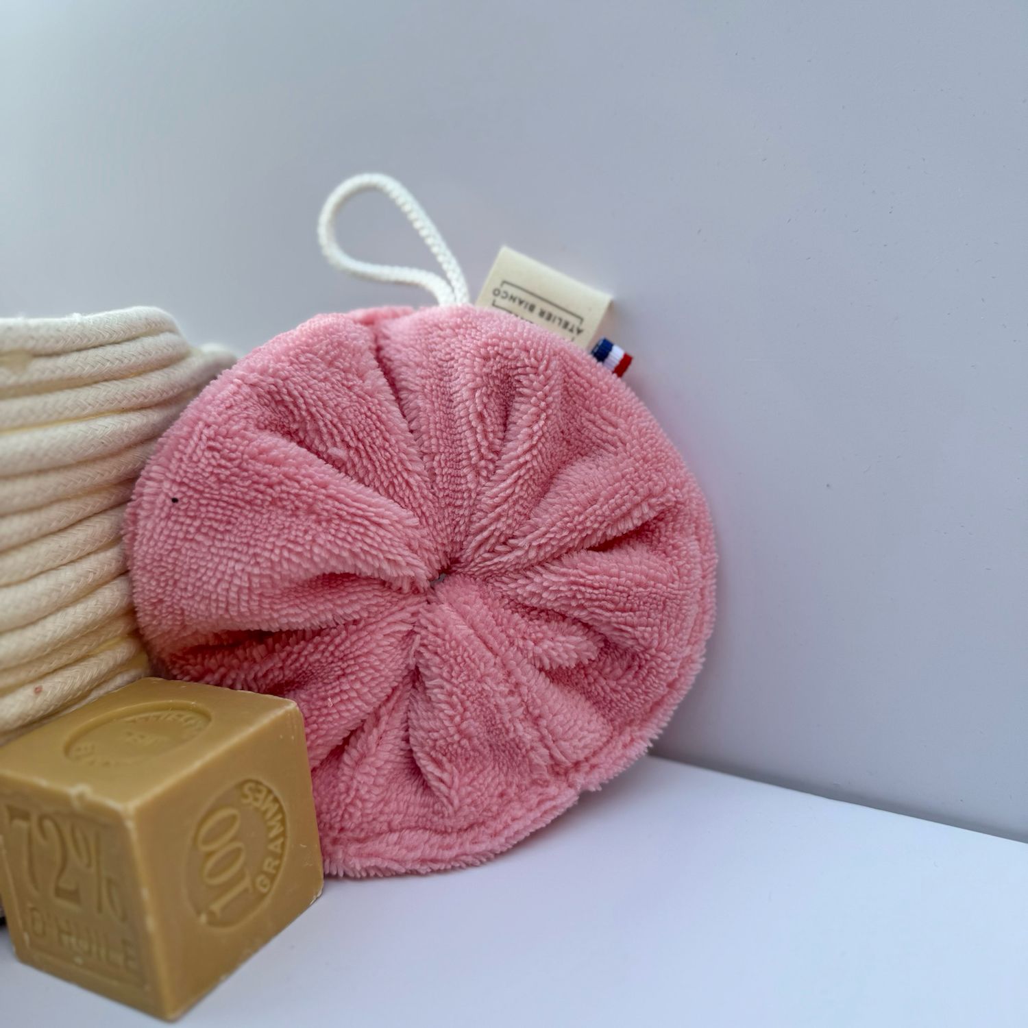 Fleur de douche rose pêche