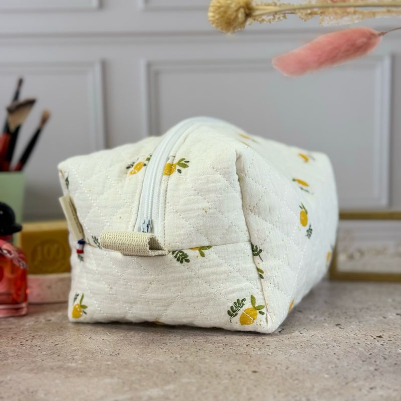 Trousse de toilette matelassée à motifs citrons