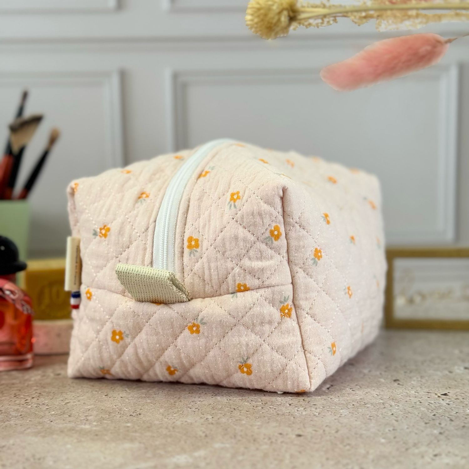 Trousse de toilette matelassée à motifs fleuris