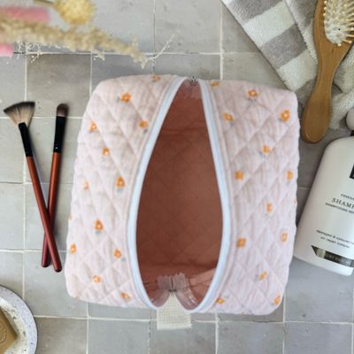 Trousse de toilette matelassée à motifs fleuris