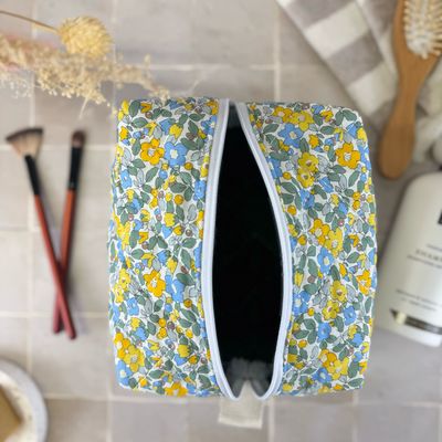 Trousse de toilette matelassée à motifs fleuris