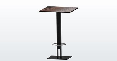 Pied de table haute mange-debout en métal – modèle CITA Pied de table haute CITA sur mesure en métal noir avec repose-pieds circulaire pour mange-debout carré style bistro / mange