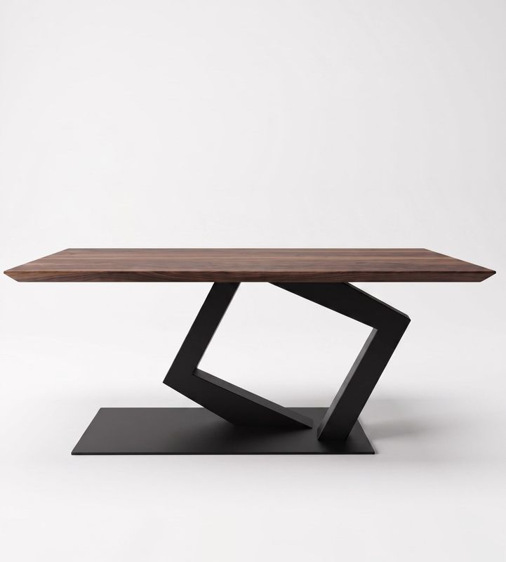 Pied de table central sculptural noir – modèle WALKING (cube en mouvement) Pied de table central sculptural en métal noir WALKING représentant un cube en mouvement.