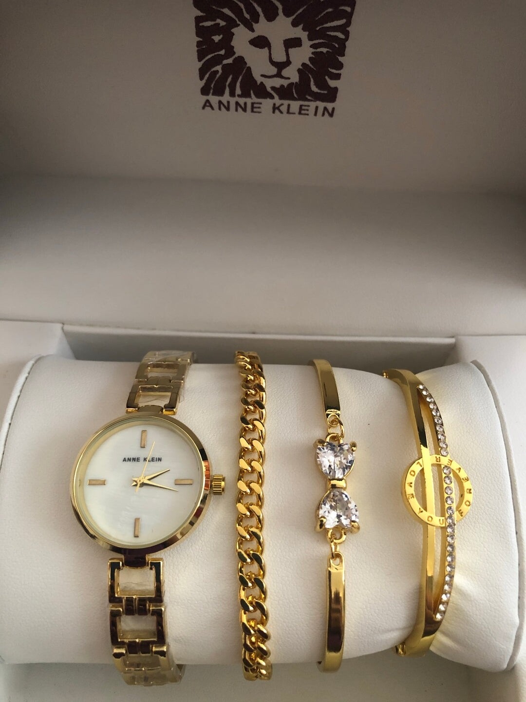 Anne Klein watch and bracelet set golf with white face