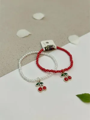 PULSERA DE PERLA CON DIJE CEREZA