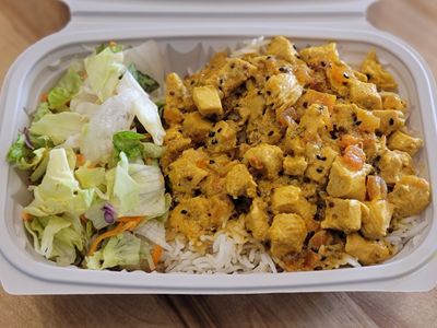 Chicken Achari over Rice