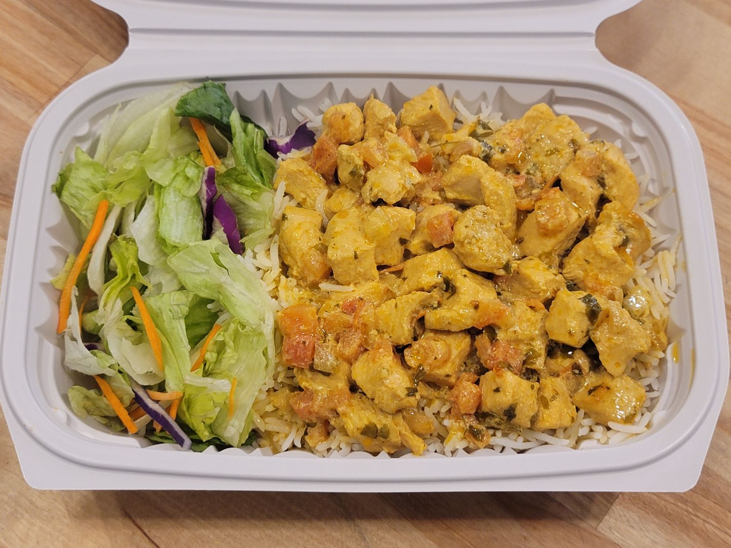 Chicken Handi over Rice