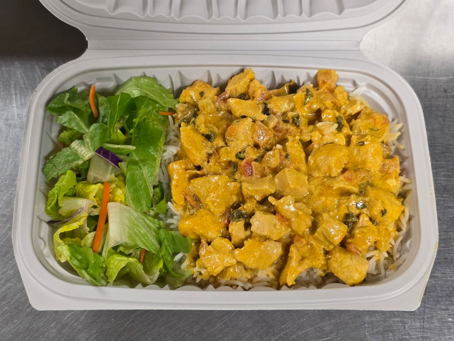 Chicken Handi over Rice