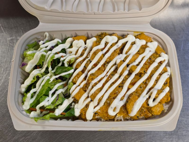 Chicken Achari over Rice
