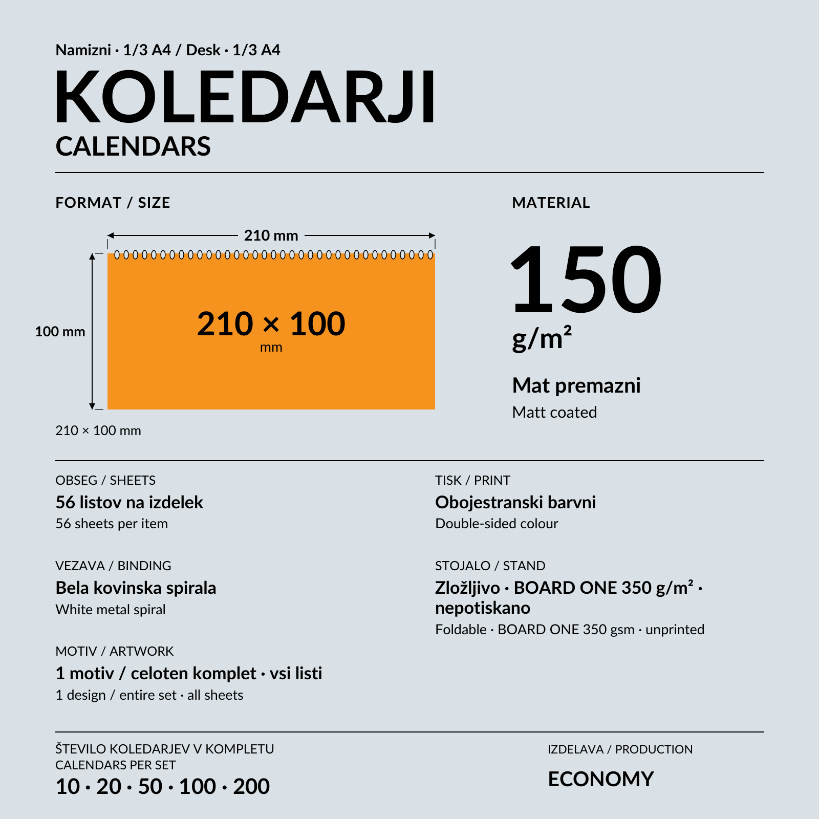 Namizni koledar 1/3 A4 z belo spiralo na oranžni pisalni mizi.