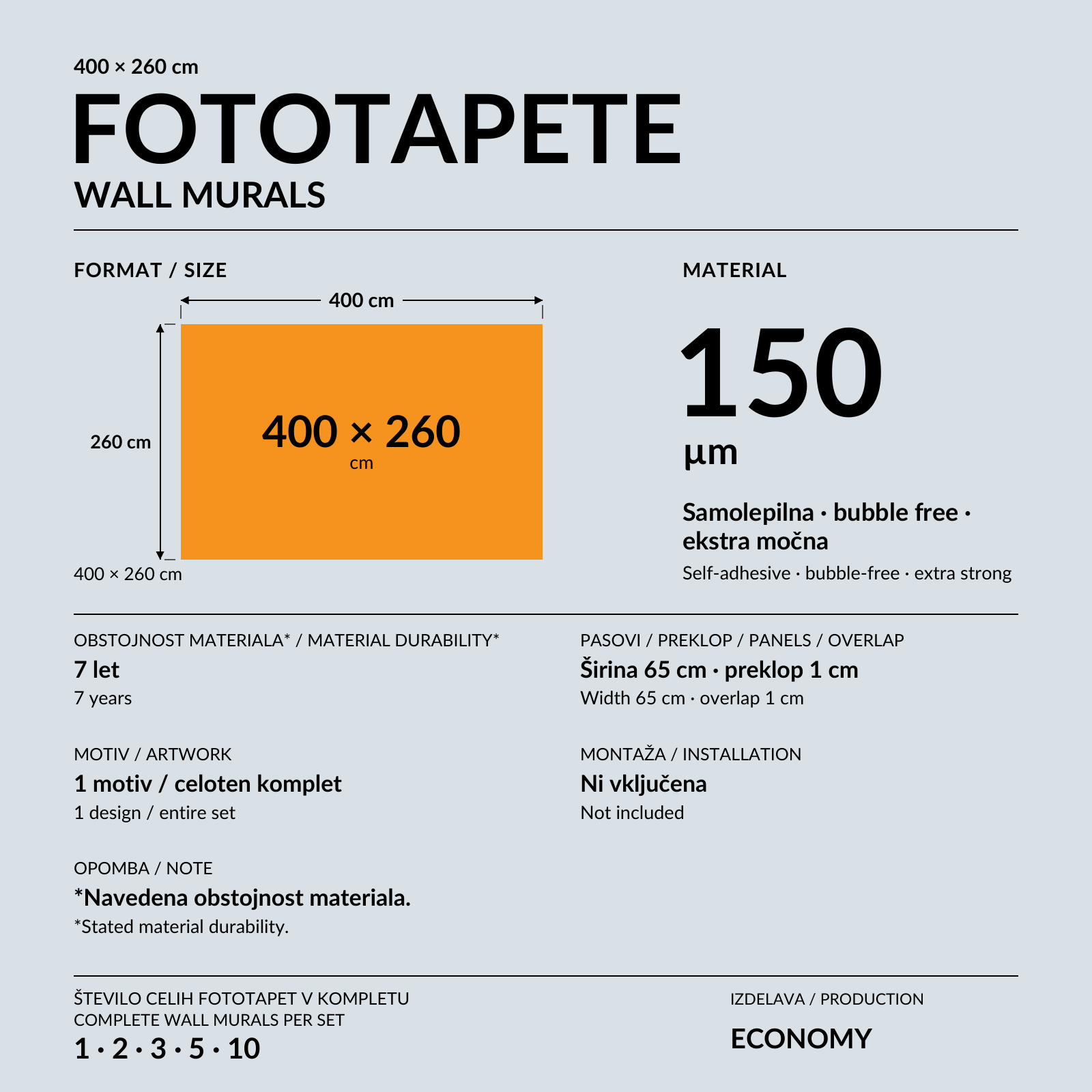 Fototapeta 400 × 260 cm z oranžno, črno in belo geometrijo na steni sivinsko opremljene sobe.